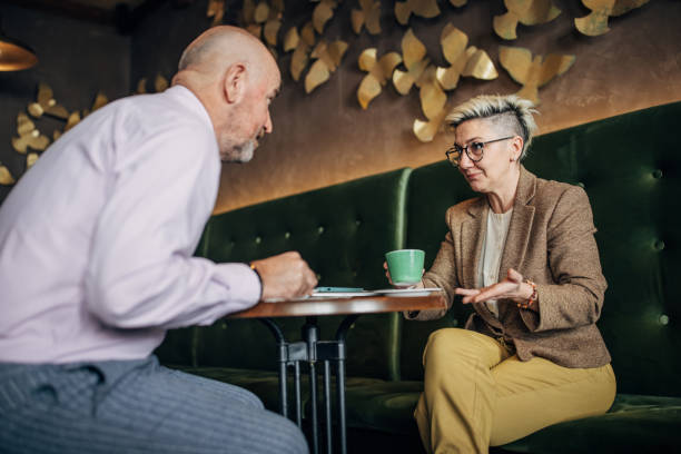 istock Man and woman in cafe 1385432430