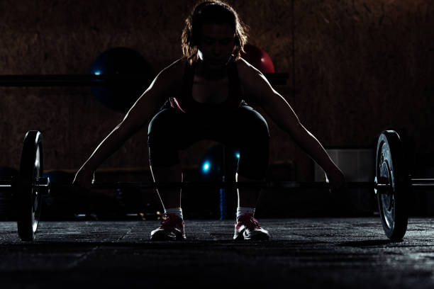 istock Strong girl in the gym 1385432549