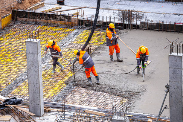 istock Concrete pouring on the construction site. 1385433837