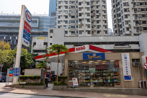 Hong Kong - March 15, 2022 : General view of the Esso gas station and Tiger Mart in Happy Valley, Hong Kong.
