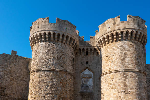 istock Sea Gate Stone towers with Christian reliefs. 1385435255