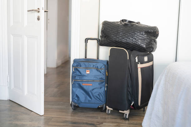 istock Luggage piled up near corridor 1385443093