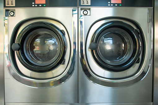Two washing machines in a laundromat