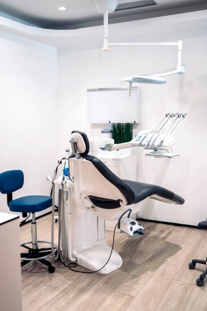 istock Modern Dental Clinic Inside Portrait 1385461241
