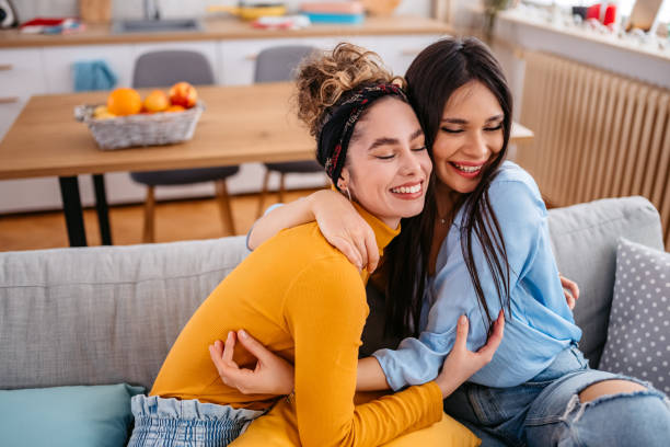istock Two Female Friends Embracing Each Other 1385461497