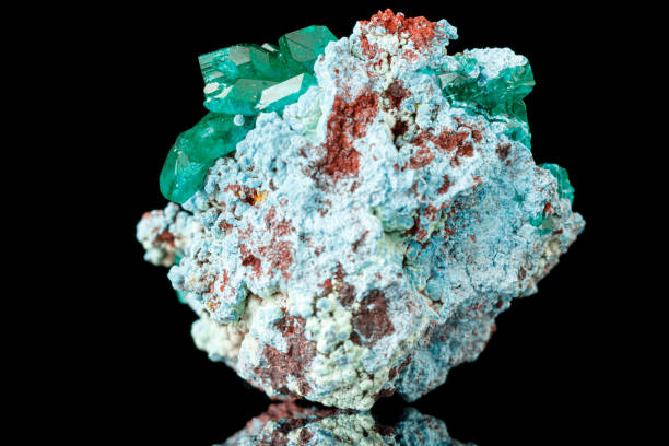 istock macro mineral stone Dioptase on a black background 1385463825
