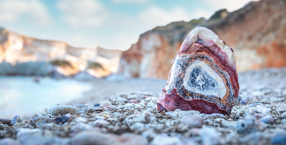 Colourful volcanic rocks on Kastanas beach, Milos (Cyclades, Greece).