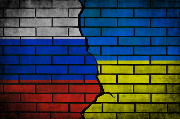 istock Russia vs Ukraine conflict and war flags background 1385464180