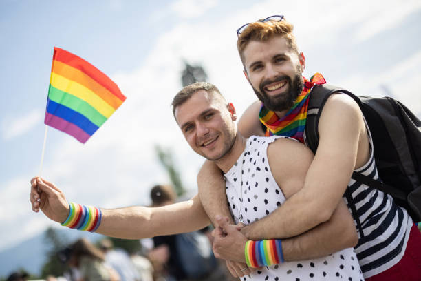 istock Men at the LGBTQ pride parade 1385471630