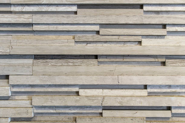 istock The stone wall is cut from small slabs to form a horizontal,Interior decoration materials,gray stone wall 1385488283