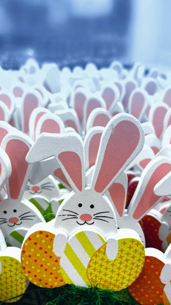 istock Wooden figures of a rabbit as a background for Easter 1385492492