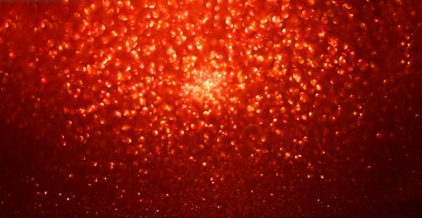 istock glittering red background texture for christmas decorations, defocused 1385497909