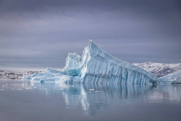 istock Extreme icebergs floating over north pole 1385505875