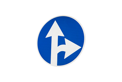 Right blue sign on a road, isolated on the white background.
