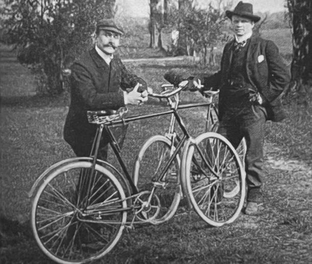 istock Thomas Mann, German author and Paul Ehrenburg, German painter, holding their bikes 1899 1385509513