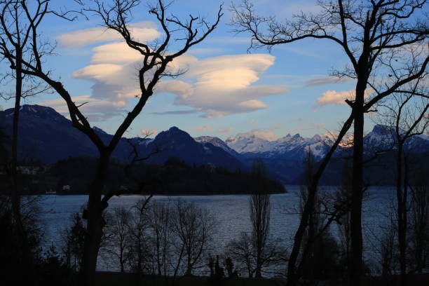 Round white clouds over Lake Lucerne. stock photo