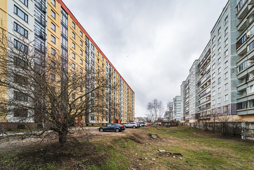 Riga, Latvia - February 20, 2022: The Soviet-era architecture of the Ziepniekkalns residential area with its ugly, untidy surroundings