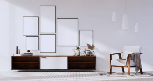 istock Mock up empty picture frame on the white wall of the room.3D rendering 1385515503