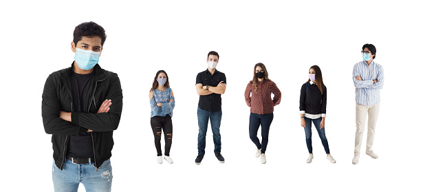Latin students with protective face masks standing in line.