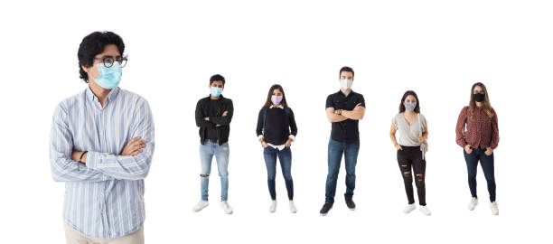 istock Latin students with face masks standing in a row 1385516224