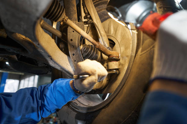 istock Man is performing technical inspection of car 1385518066