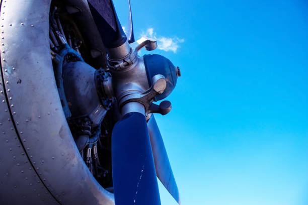 istock Closeup rotor of plane on blue sky background 1385520470