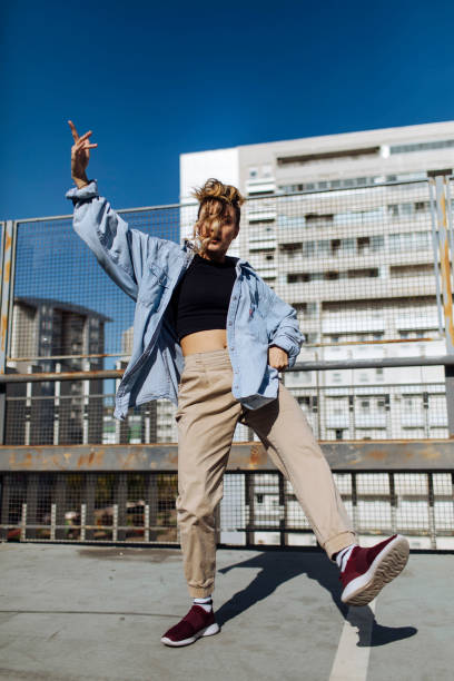istock Girl on rooftop 1385521398