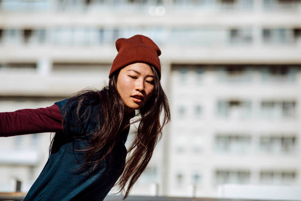 istock City girl dance 1385521416