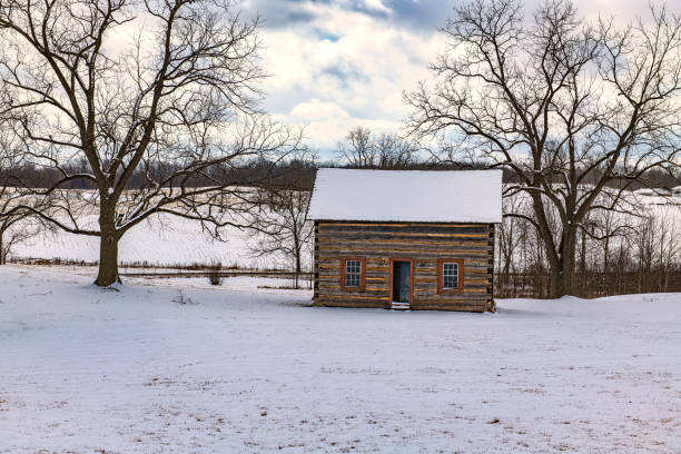 istock Log Cabin in the winter 1385521730