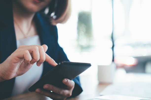 istock Close up of man using mobile phone. 1385521741