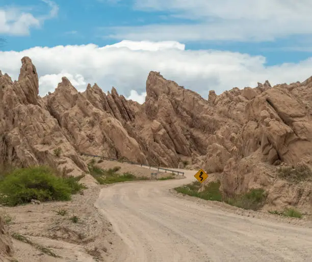 Photo of Quebrada de las flechas (Arrows Creek), Argentina Route 40. Stunning spiky rock formations pointing diagonally upwards and thus resembling arrows, Salta Province, Argentina