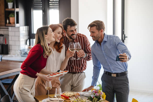 istock Group of friends taking a selfie before eating 1385526295