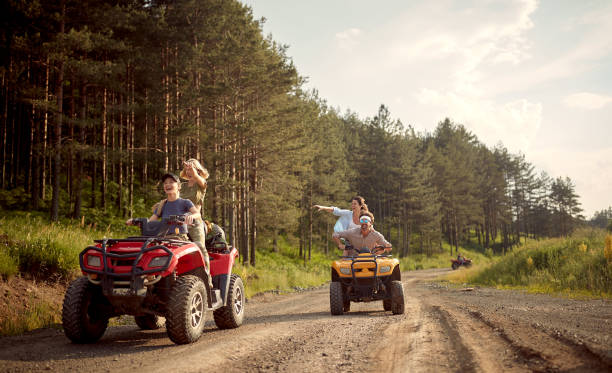 istock young friends driving a off road buggy car 1385537920