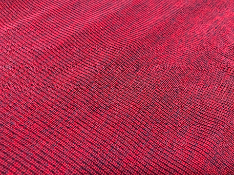 A red fabric with a little blue.