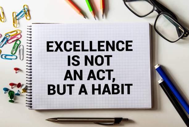 istock Text excellence is not a act but a habit on the short note texture background. 1385540485