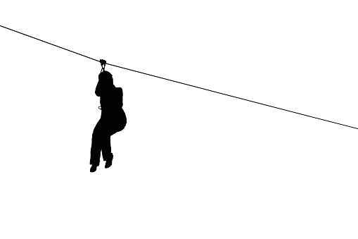 silhouette of side view of young woman riding on zip line isolated on white background.