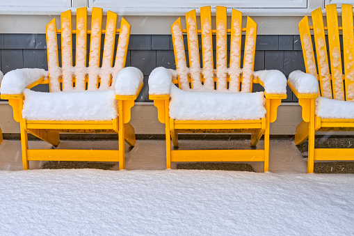 Adirondack chair in a winter snowfall