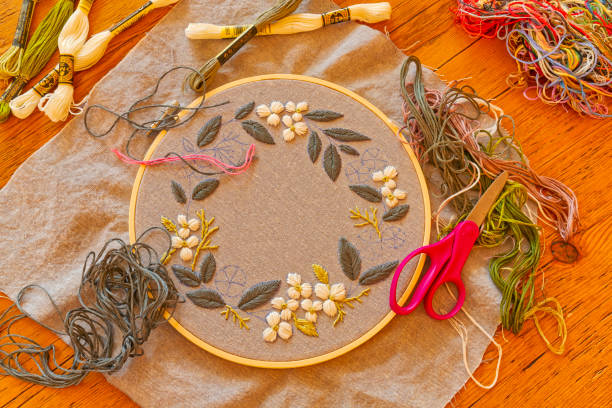 особенности загородного коттеджа - embroidery spool thread sewing стоковые фото и изображения