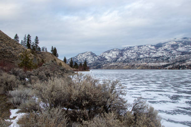 istock frozen lake in winter in the mountains 1385578378