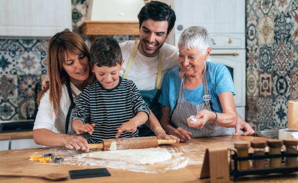 istock family cooking 1385578587