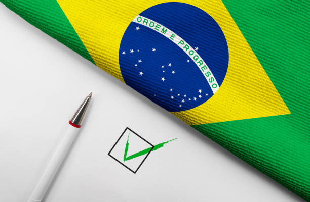Pencil, Flag of Brazil and check mark on paper sheet