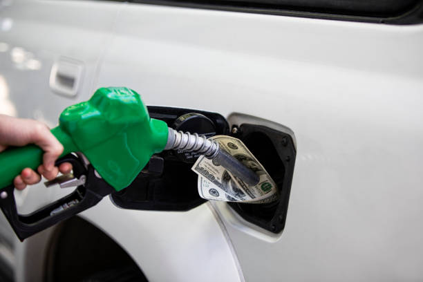 istock Gas Prices Increasing at the Pump Station 1385591753