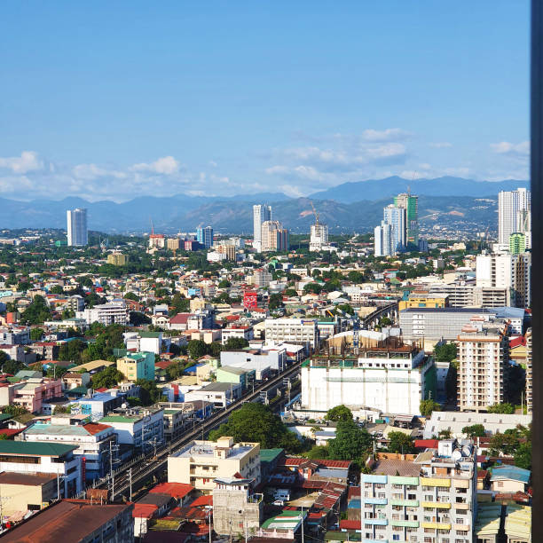 istock Clear city sky at Manhattan Cubao 1385598983