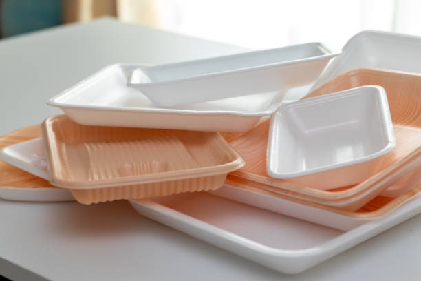 istock Lots of plastic trays on the table 1385599676