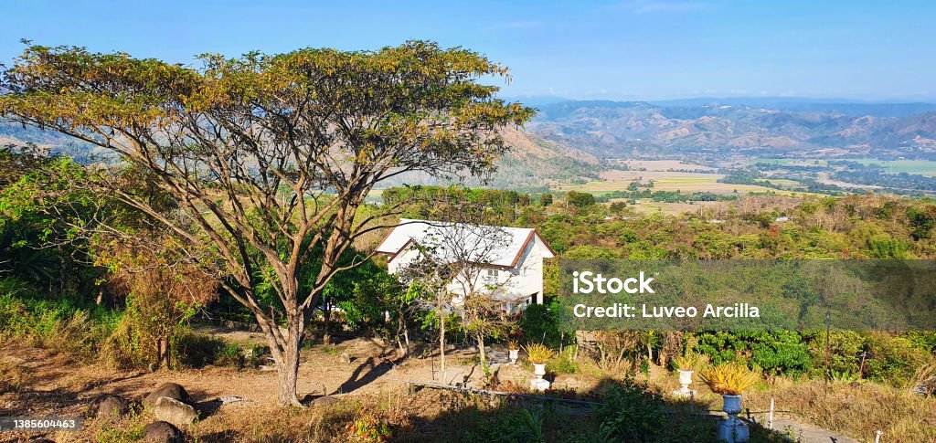 Hill House in the forest overlooking the mountain range at Tarlac Color Image Stock Photo