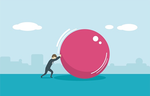 A man pushes a huge ball, a vector illustration that can be split and enlarged