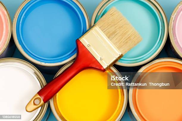 Paint Cans And Paint Brushes And How To Choose The Perfect Interior Paint Color And Good For Health Stock Photo - Download Image Now