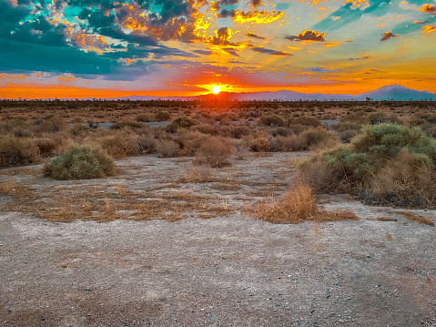 dramatic morning sunrise western desert area dry mountains sunshine horizon