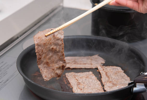 istock Bake meat in an IH frying pan 1385618827