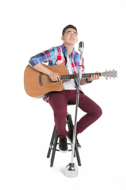 istock young chinese male singer 1385619425